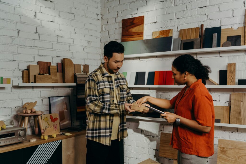 A sales rep showing a product to a customer